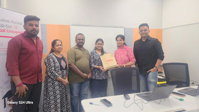 upGrad Kasturi Nagar office - student and parents with the counselling team after their study abroad session